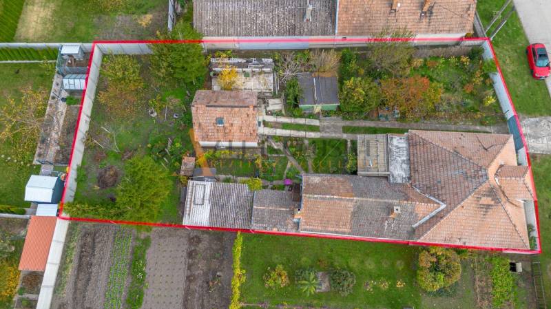 Aerial view of a family house and garden in Veľké Dvorníky.