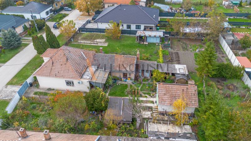 A family house in Veľké Dvorníky with a spacious garden and surrounding greenery.