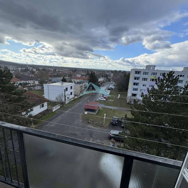 View from a 4-room apartment on Gyurkyho in Šahy, showing a city street and houses.