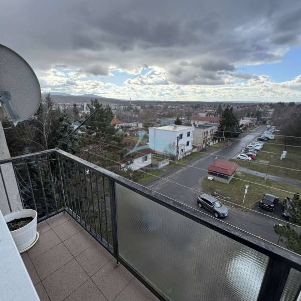 View of the street and Gyurkyho in Šahy from a 4-room apartment with parking.