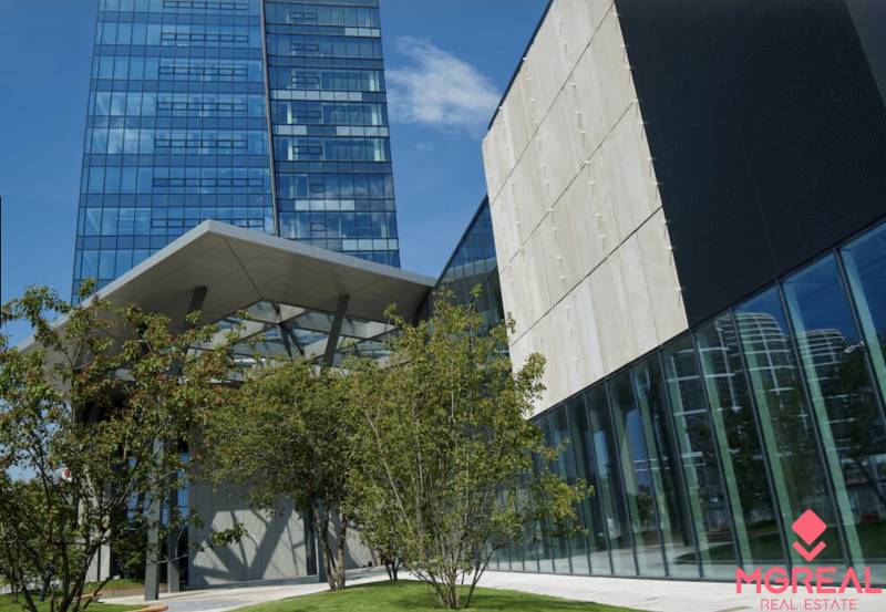 Glass facade of the building with a canopy and greenery at Mlynské Nivy, Bratislava - Nivy, offices.