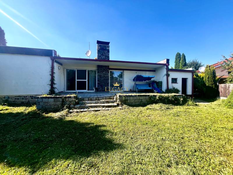 Family house in Ivanka pri Dunaji with a garden and terrace, stone cladding on the facade.