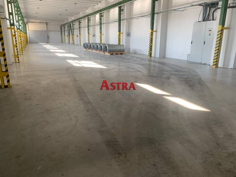 Spacious interior with storage spaces and steel barrels, Warehouses and halls.