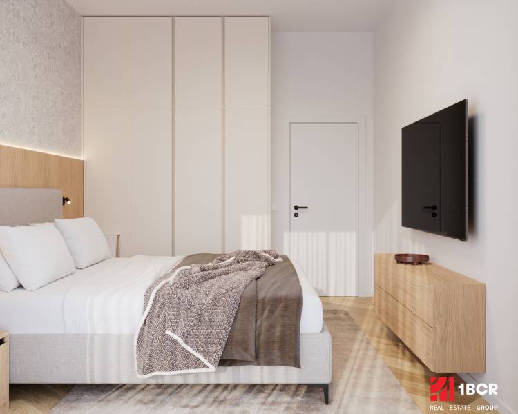 Bedroom in a 4-room apartment with wood-patterned flooring and a built-in wardrobe.