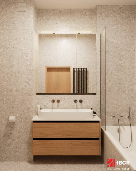 A bathroom in a 4-room apartment with a wooden decor cabinet and a bathtub.
