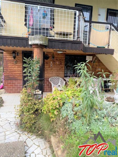 A cottage in the Košice - Vyšné Opátske district with a garden and terrace.