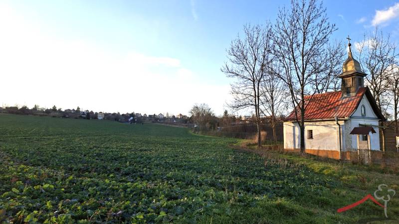 Chapel on the Recreational Grounds in Vráble, Vinice Street, surrounded by fields and trees.