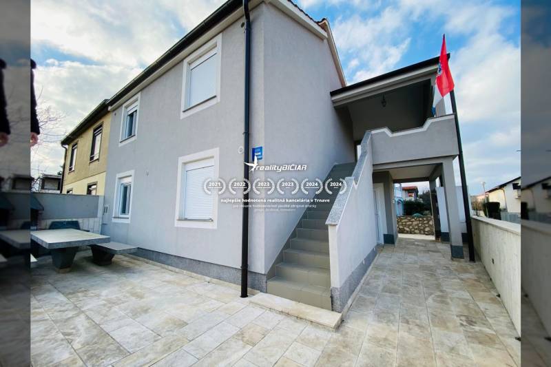 A family house on Grbi Street in Nin with an external staircase and a terrace.