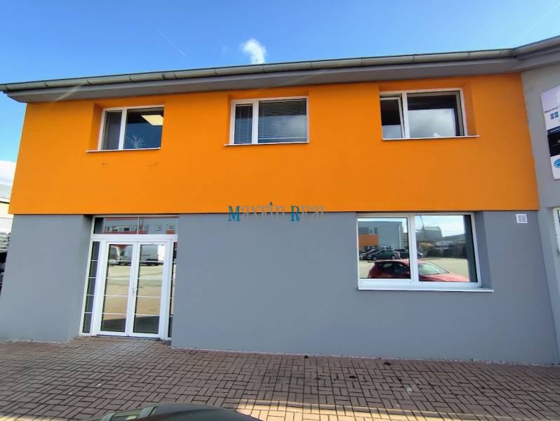 Building on Štúrova Street in Nitra, commercial premises with a light facade.