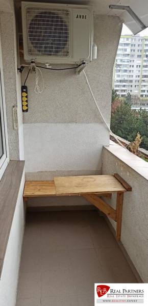 Balcony in a 2-room apartment on Pečnianska Street, Bratislava - Petržalka, with air conditioning.