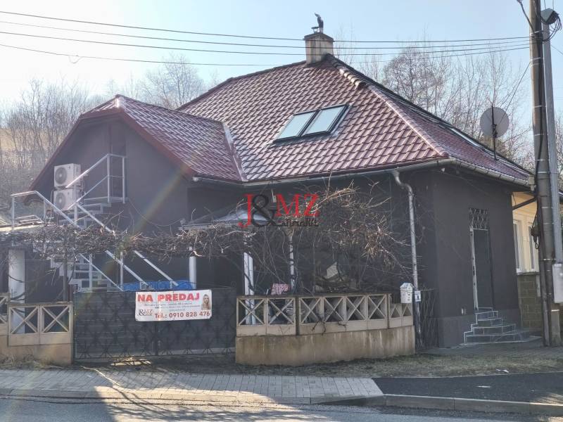 A family house on Rudlovská Road in Banská Bystrica with a dark facade.