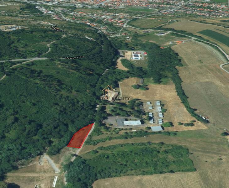 Aerial view of land - housing in Krupina with surrounding nature.