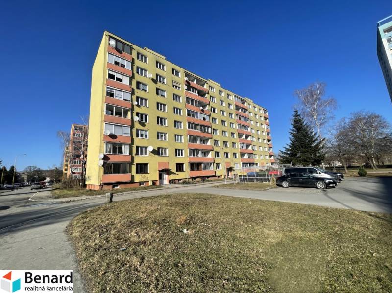 Apartment building on Matice Slovenskej Street in Prešov with parked cars in front of the building.