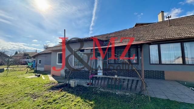 A family house in Mýtne Ludany with a well-maintained garden and a sunny terrace.