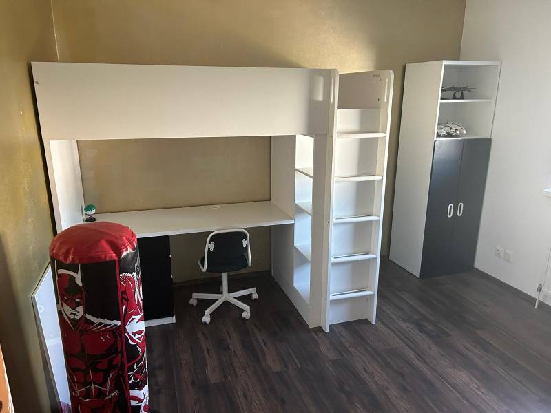 Children's room with a bunk bed, desk, and wardrobe in a 3-room apartment.