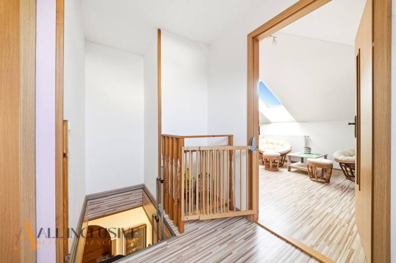 Staircase and attic room, wooden decor flooring in a family house.