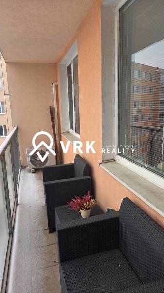 A balcony with rattan furniture at an apartment on Humenská Street, Košice - Západ district.