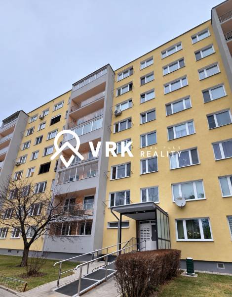 Apartment building on Humenská, Košice - Západ district. Entrance with railing and glazing.