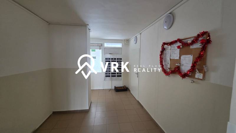 Hallway with mailboxes and a bulletin board, Humenská Street, Košice - Západ district.