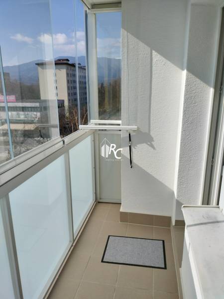Glazed balcony with a view of the city MartinJilemnického in a 2-room apartment.