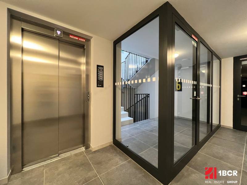 Elevator and glass staircase in the building on Hraničná in Bratislava - Ružinov.