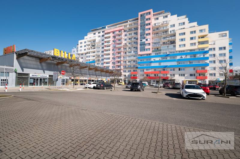 Billa on Saratovská Street, Bratislava - Dúbravka, next to a residential building with a parking lot.