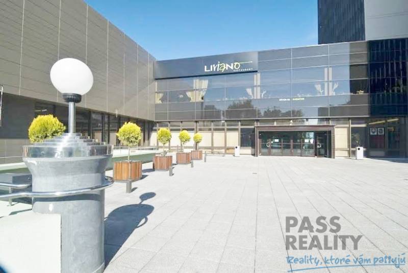 Exterior of offices on Kutlíkova in Bratislava - Lúky with a terrace and green plants.