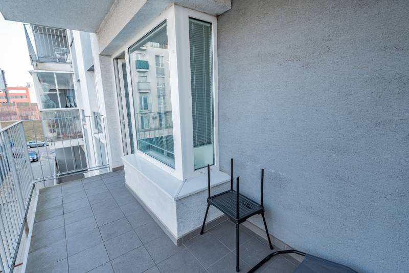 The balcony of a 2-room apartment with a view of Hrachová Street in Bratislava - Ružinov.