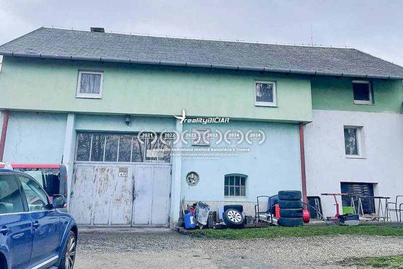 A family house in Pavlice on Pavlice Street with a garage and parking on the property.