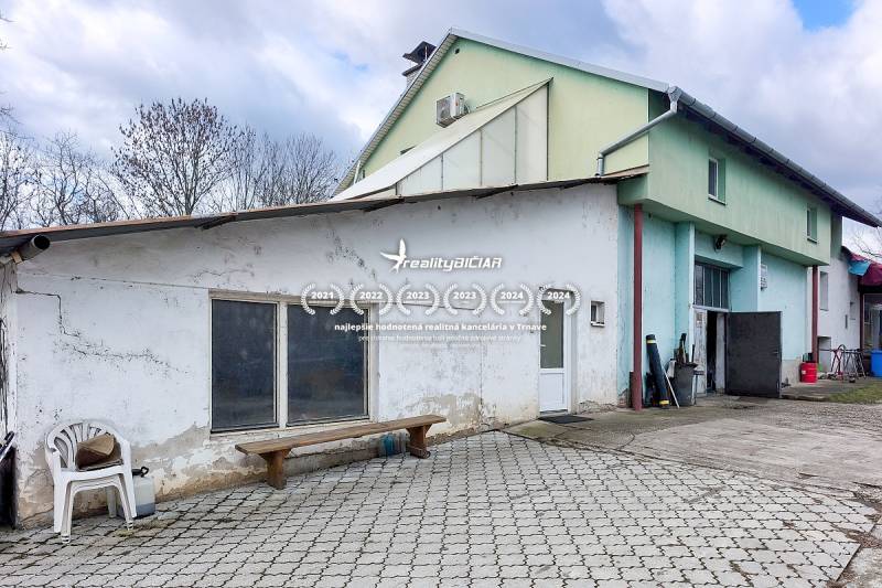 Family house in Pavlice on Pavlice Street with a simple facade and paving stones.