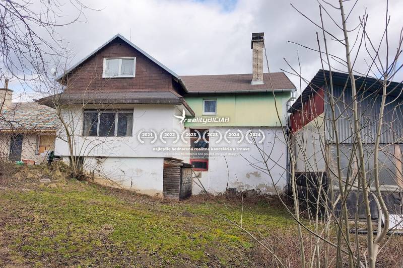 A family house in Pavlice in Pavlice, with plaster and an attic in a village environment.