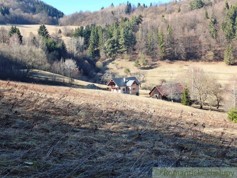 Cottages surrounded by forests on agricultural and forest land near Hronec.