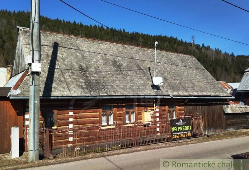 Family house in Osturňa with wooden elements and shingle roof for sale.