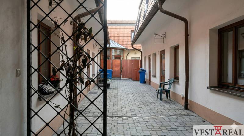 Courtyard with interlocking paving on Pekárska Street in Trnava, suitable for studio apartments.