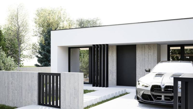 A single-story family house in Nesvady with a BMW on the driveway.