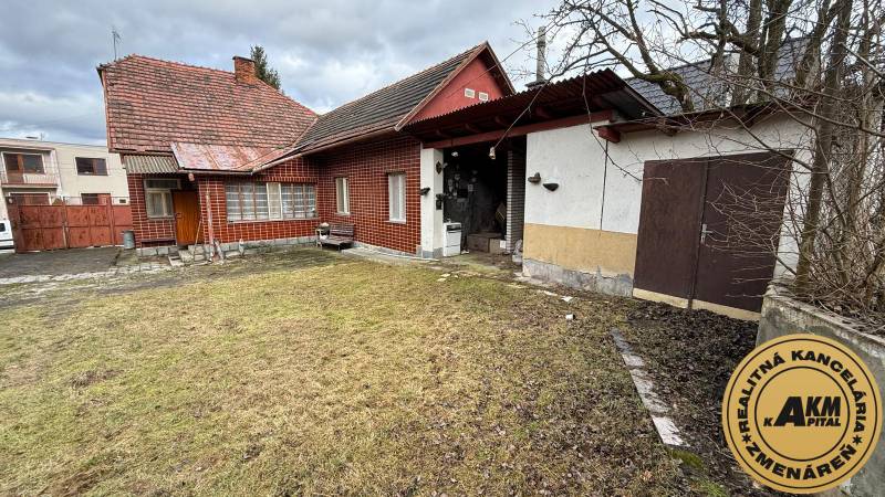 A family house in Babiná with a pitched roof, garden, and an annex.