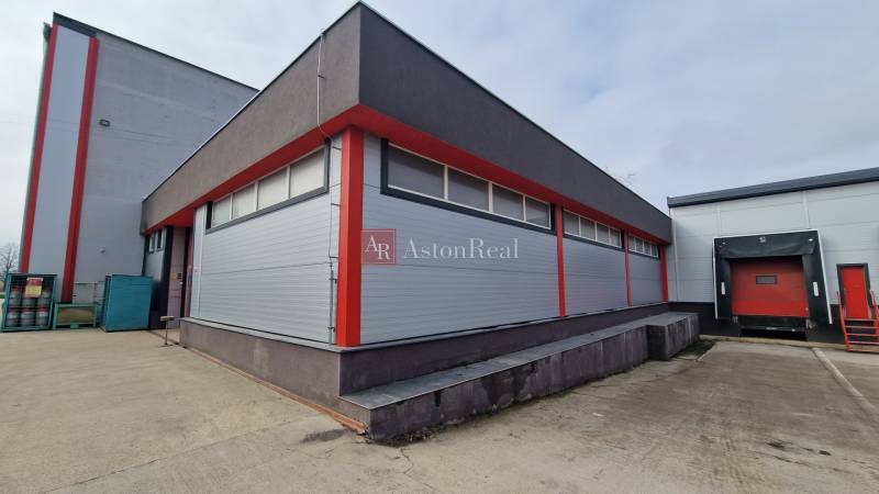 An industrial warehouse on Východná Street in Poprad, equipped with a loading ramp and a modern facade.