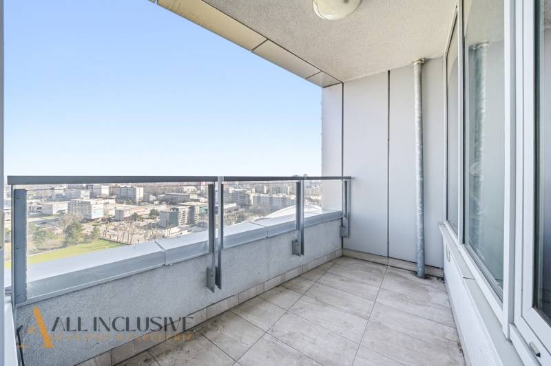 A balcony with a view of the city skyline, 2-room apartment on Bajkalská Street in Bratislava.