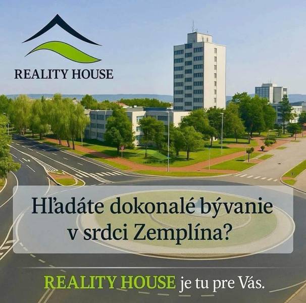 Roundabout with buildings and park greenery in the town of Hnojné, category Land - residential.