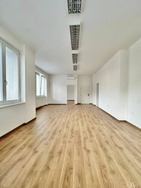 Offices with wood-patterned flooring and windows, Trenčín, M. R. Štefánika.