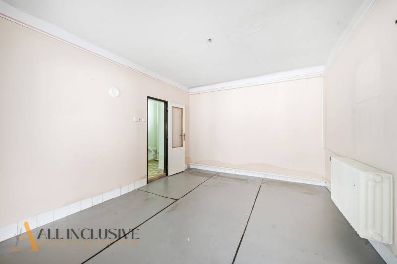 Bright room with white walls and doors in a family house.