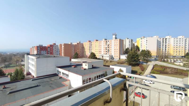 View from a 2-room apartment on Východná Street in Trenčín with panel buildings.