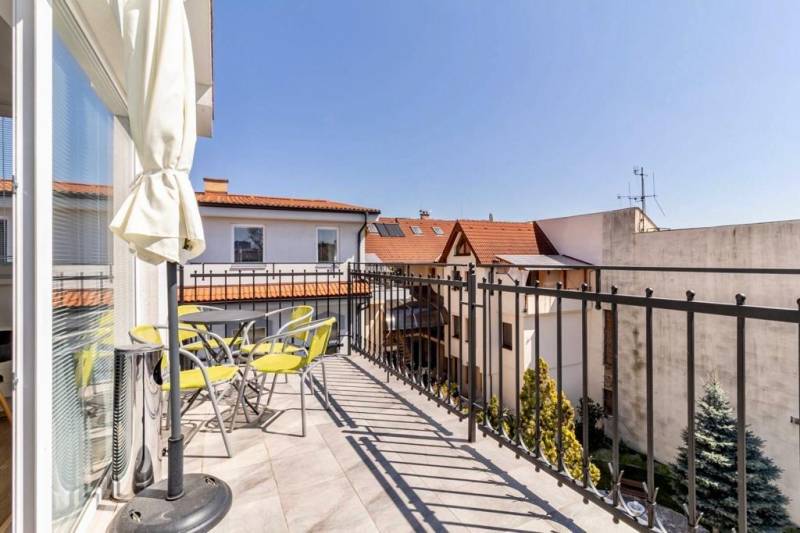 Balcony with a view of rooftops and trees, Masarykova Street, Košice - Staré Mesto district, Offices.