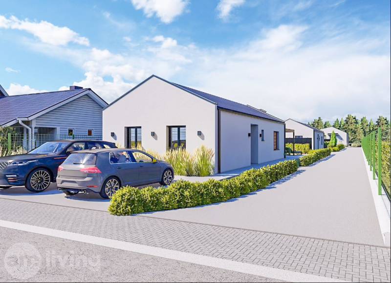 A family house in Borčice with two cars and a garden, fenced plots.