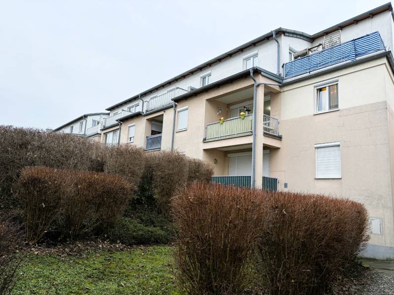 Exterior of a 3-bedroom house in Kittsee with a garden and balconies.