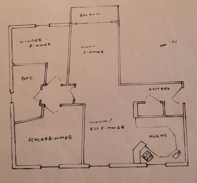Floor plan of a 3-room apartment with a balcony, kitchen, living room, bedroom, and children's room.