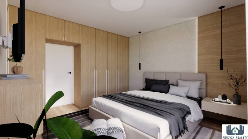 Bedroom in a 3-room apartment with a bed, built-in wardrobes, and a floor with a wooden decor.