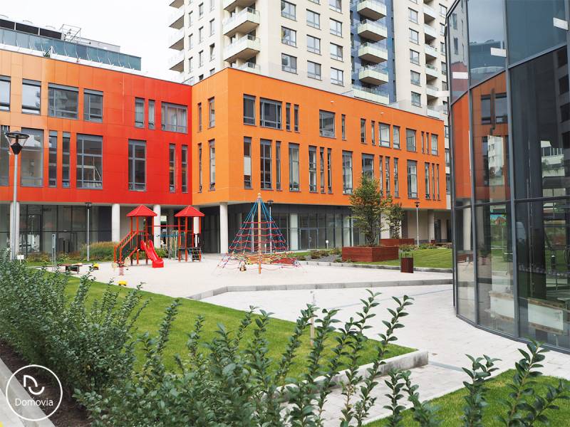 A children's playground with modern apartment buildings on Plynárenská Street in Bratislava - Ružinov.