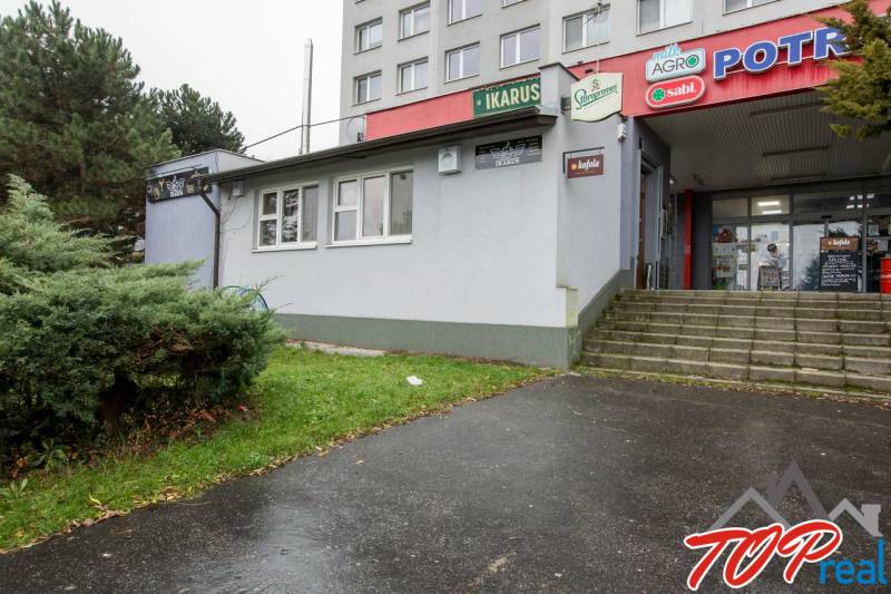 Gastro premises on Žižkova Street in Košice - Juh district, with a staircase and greenery.