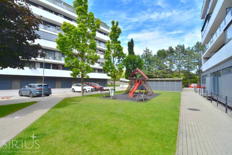 Playground in front of apartment buildings on Pri vinohradoch Street in Bratislava - Rača.
